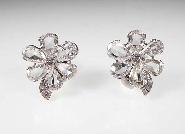 Pair of six-petal pear shaped diamond flowerhead cluster earrings